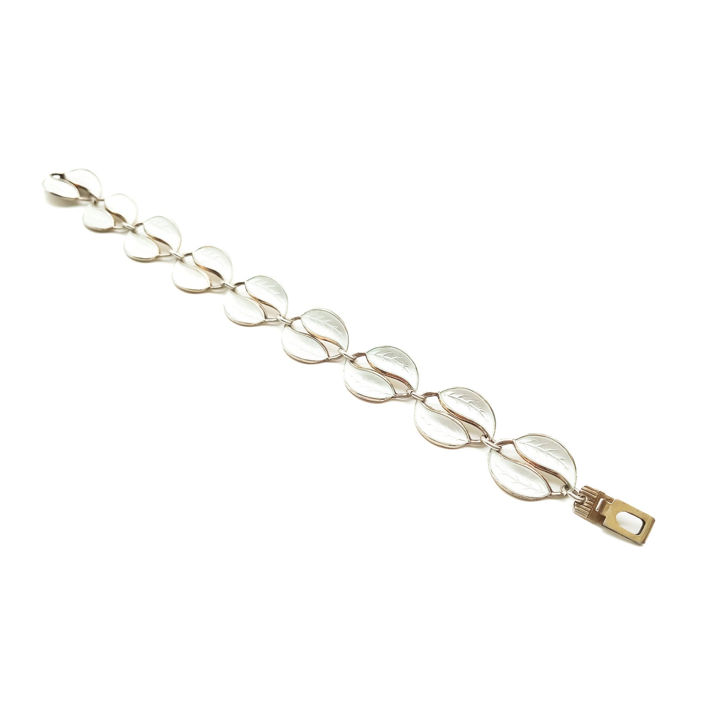 Stylish white enamelled silver gilt vintage leaf bracelet. Would work beautifully as a bridal accessory. Has a matching necklace. David Anderson. Norway.