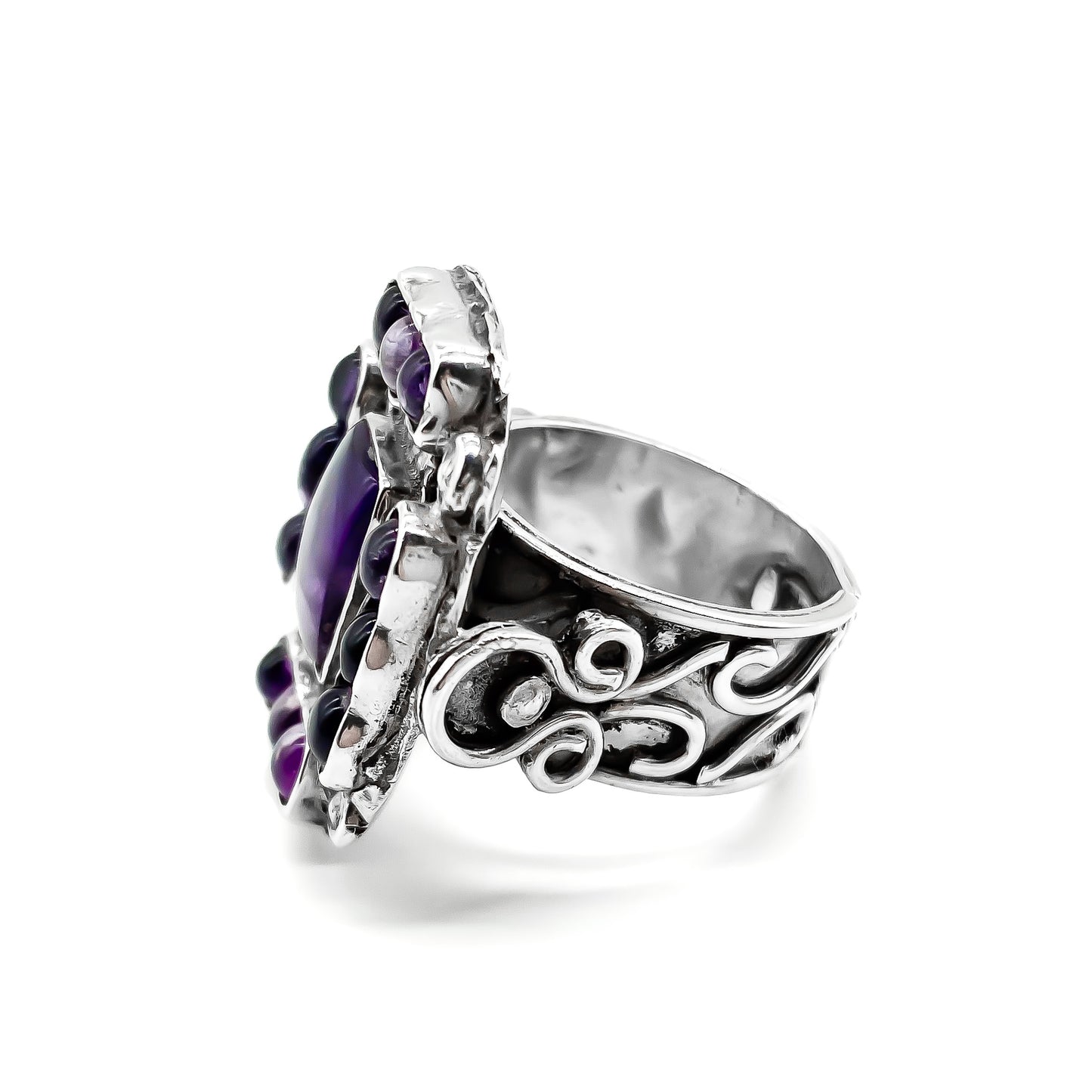 Charming vintage Mexican sterling silver ring set with deep purple cabochon amethysts.