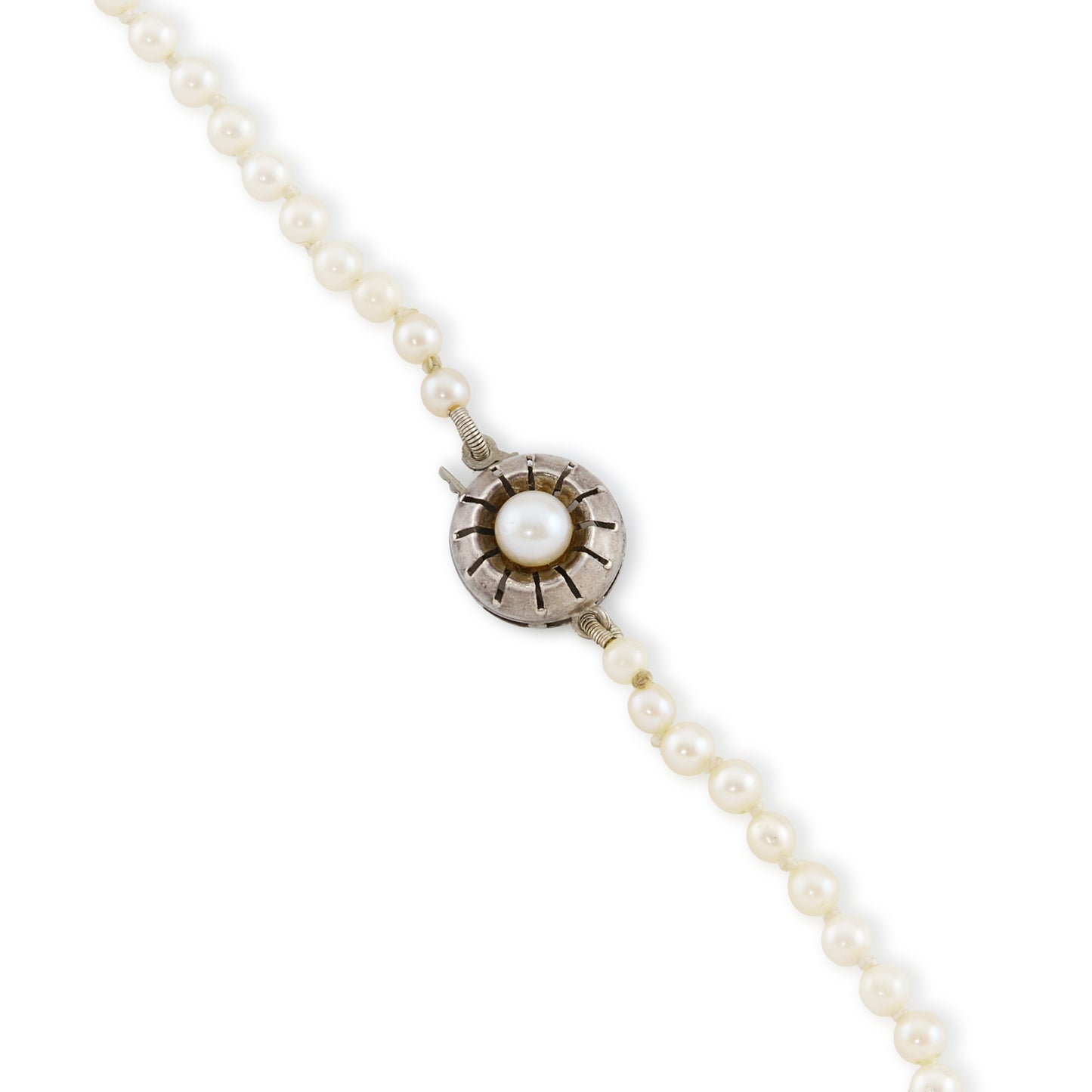 Graduated string of lustrous vintage cultured seawater pearls with sterling silver clasp set with a single pearl.