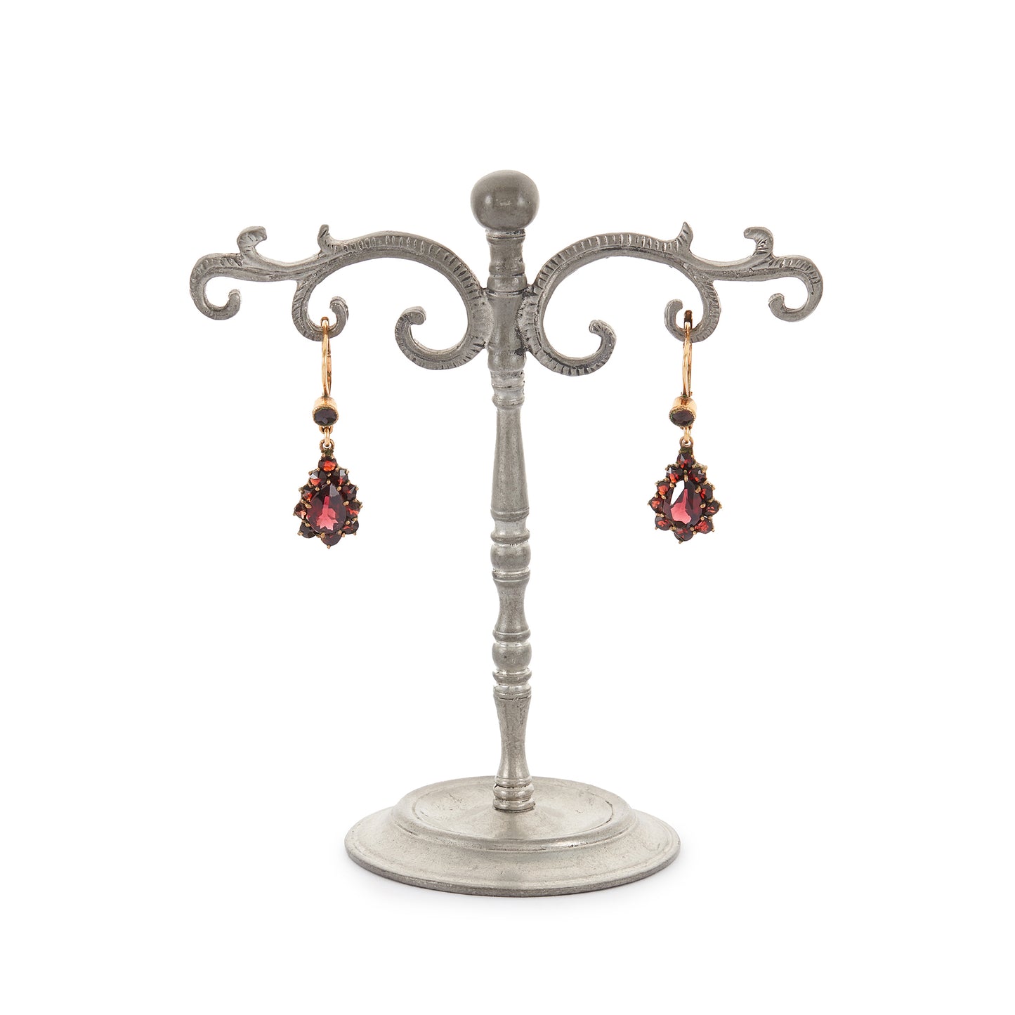 Pretty vintage dangling silver-gilt earrings set with deep red faceted garnets.