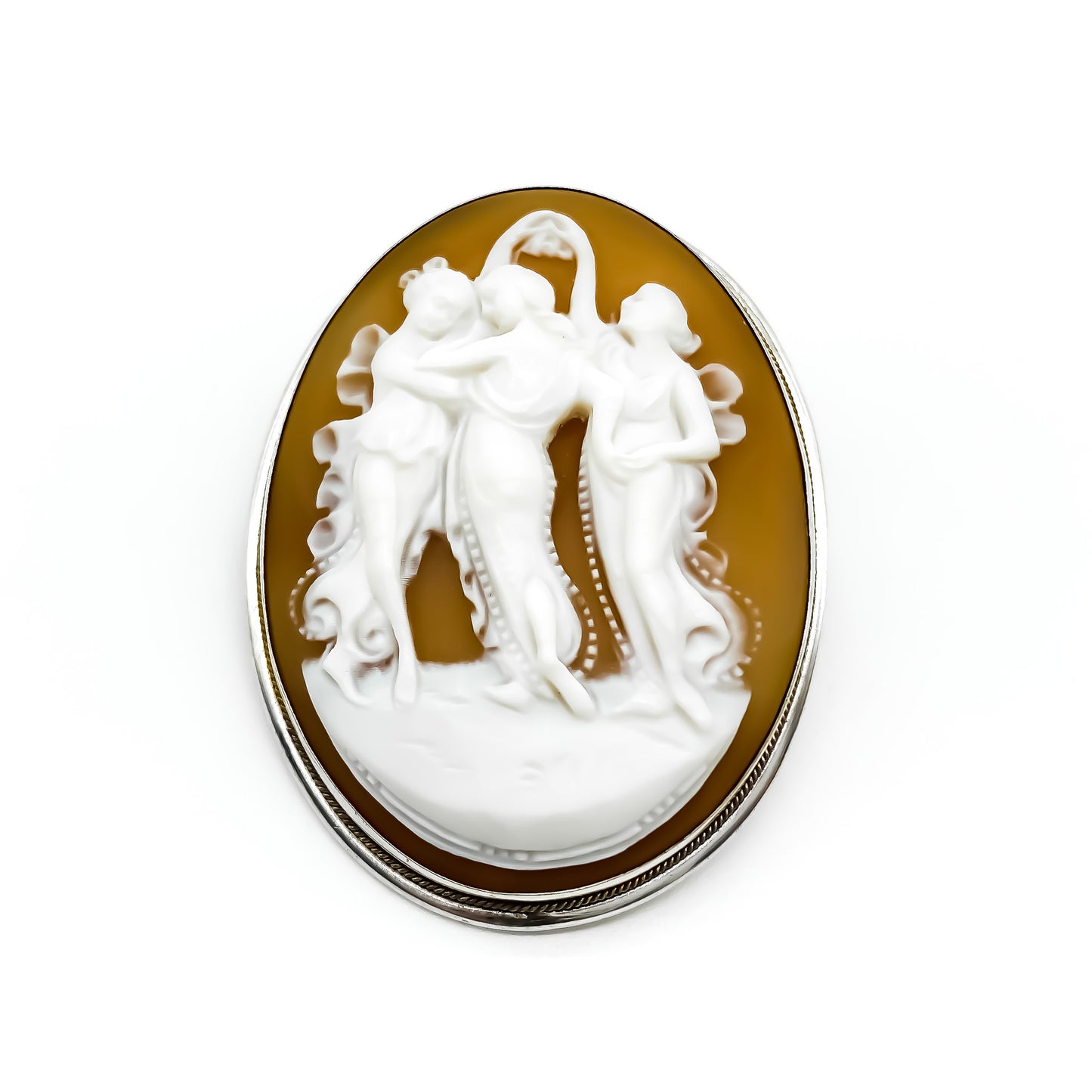 Beautiful three graces cameo brooch/pendant set in a silver frame.