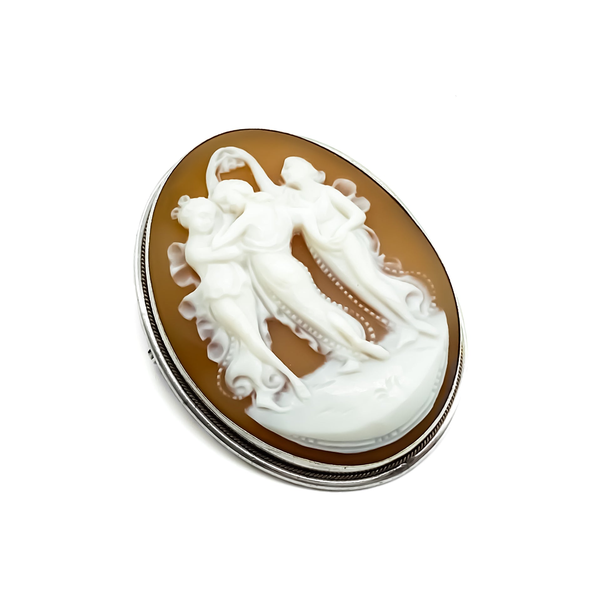 Beautiful three graces cameo brooch/pendant set in a silver frame.