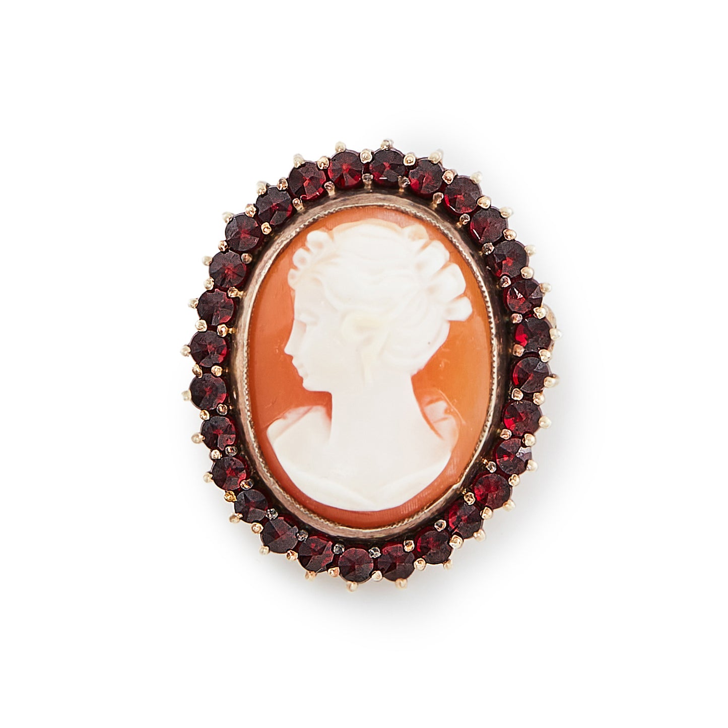 Pretty silver gilt cameo surrounded by twenty-eight deep red faceted Bohemian garnets.