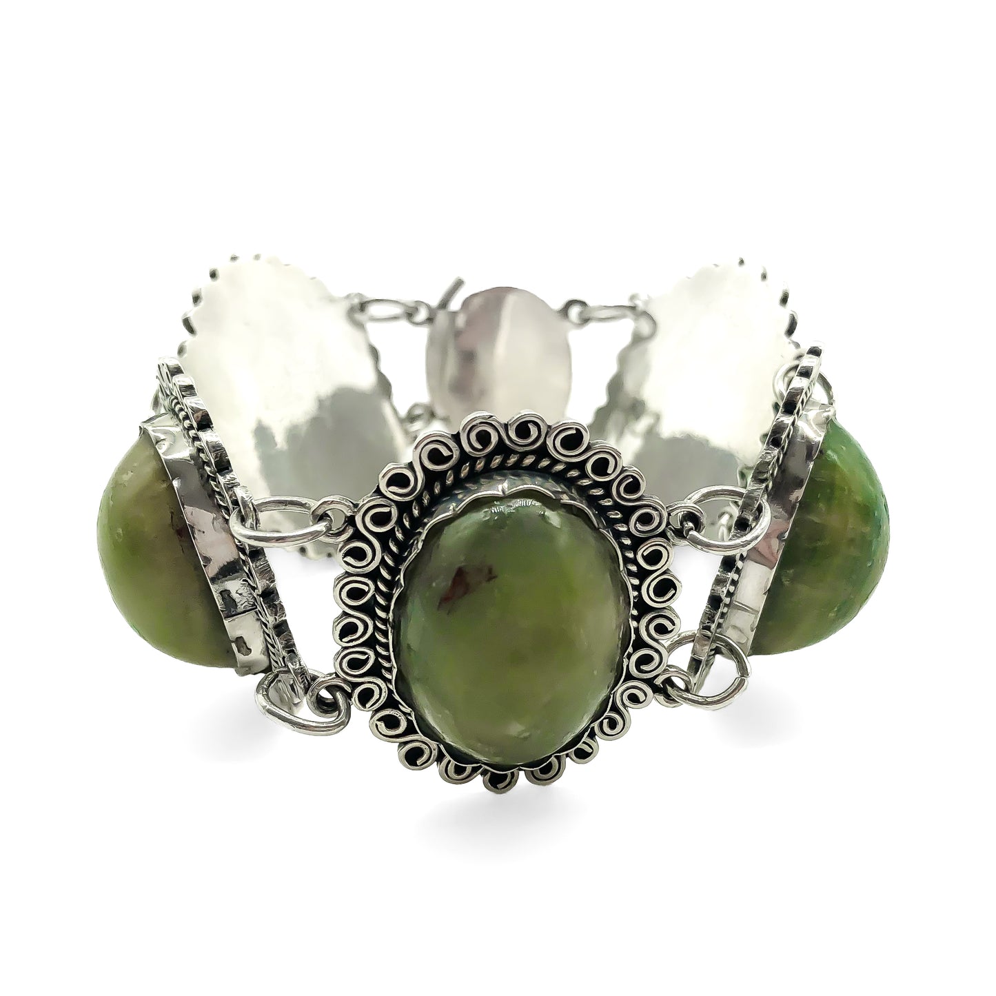 Lovely vintage silver Mexican bracelet set with natural green cabochon gemstones. Circa 1940’s