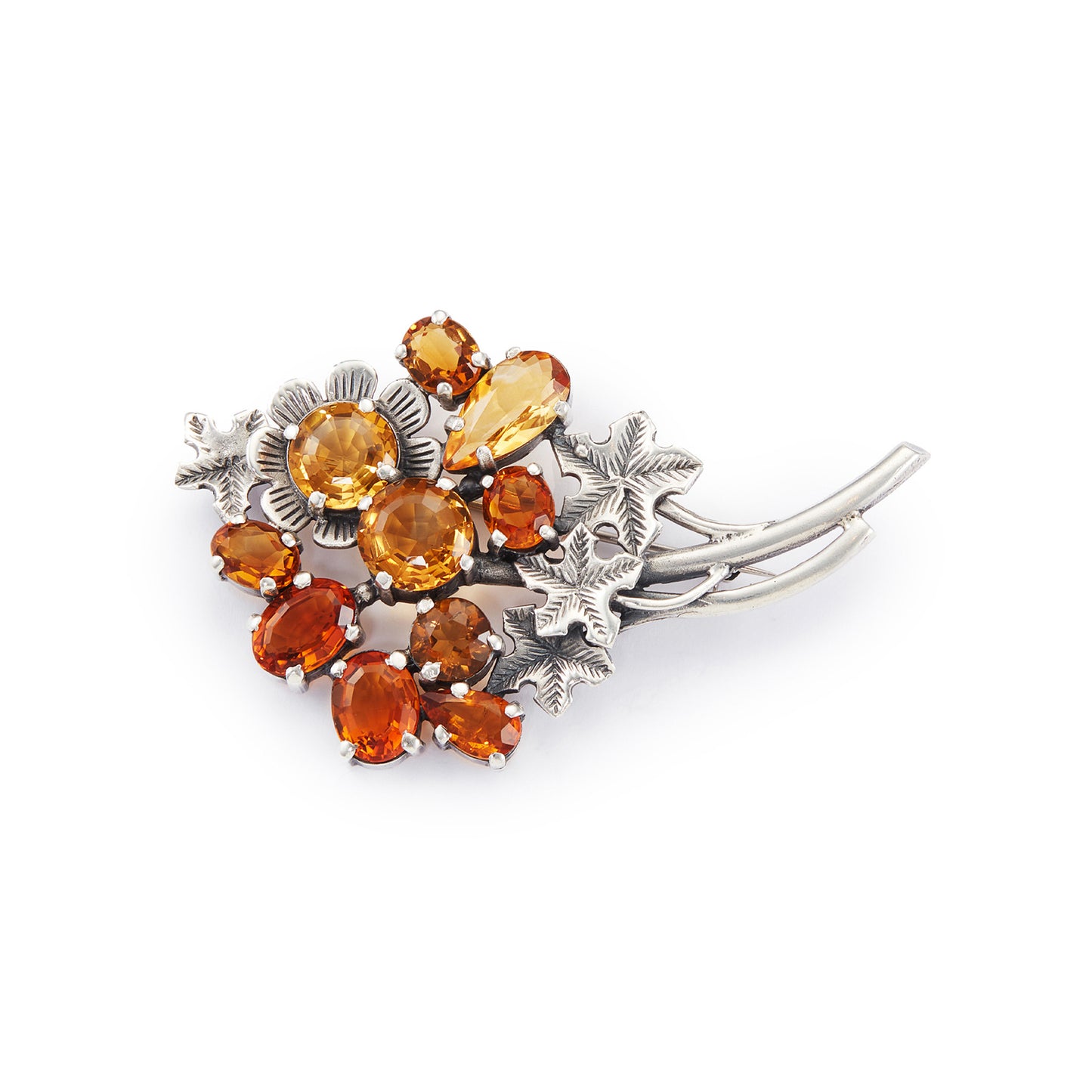 Stunning sterling silver designer brooch set with ten beautifully faceted citrines in a range of yellow and amber hues. Made by Thomas Millward & Co (Birmingham)