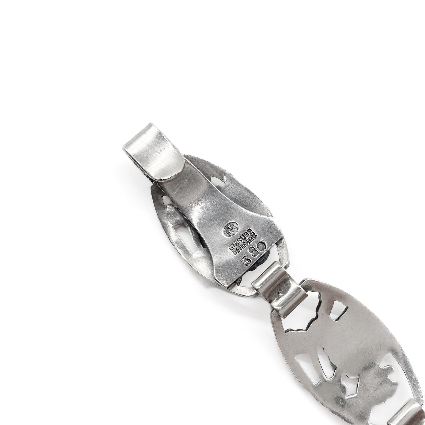 Ornate Danish sterling silver choker with fifteen links, each depicting a rose surrounded by leaves.