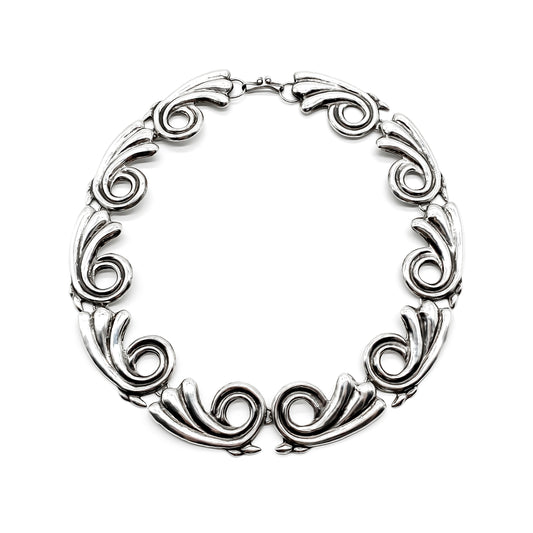Stunning vintage sterling silver Mexican necklace with reproussé design. Taxco