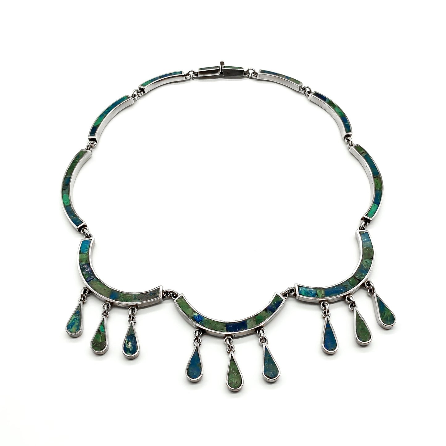Ornate sterling silver Mexican necklace with deep green and blue crushed stone inlay and dangling drops. Designer: Los Castillo. Eagle Hallmark (Post 1947) Taxco.