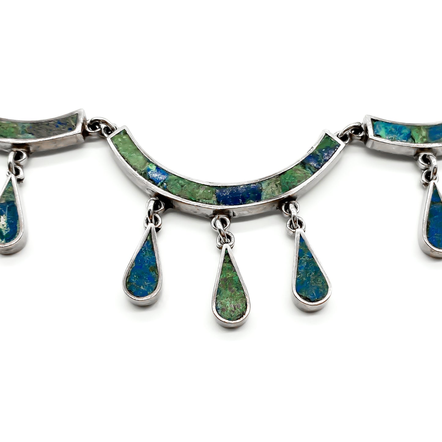 Ornate sterling silver Mexican necklace with deep green and blue crushed stone inlay and dangling drops. Designer: Los Castillo. Eagle Hallmark (Post 1947) Taxco.