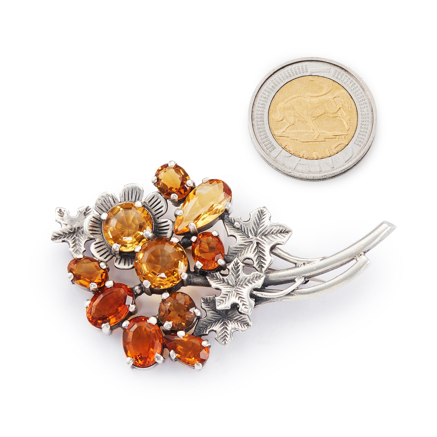 Stunning sterling silver designer brooch set with ten beautifully faceted citrines in a range of yellow and amber hues. Made by Thomas Millward & Co (Birmingham)