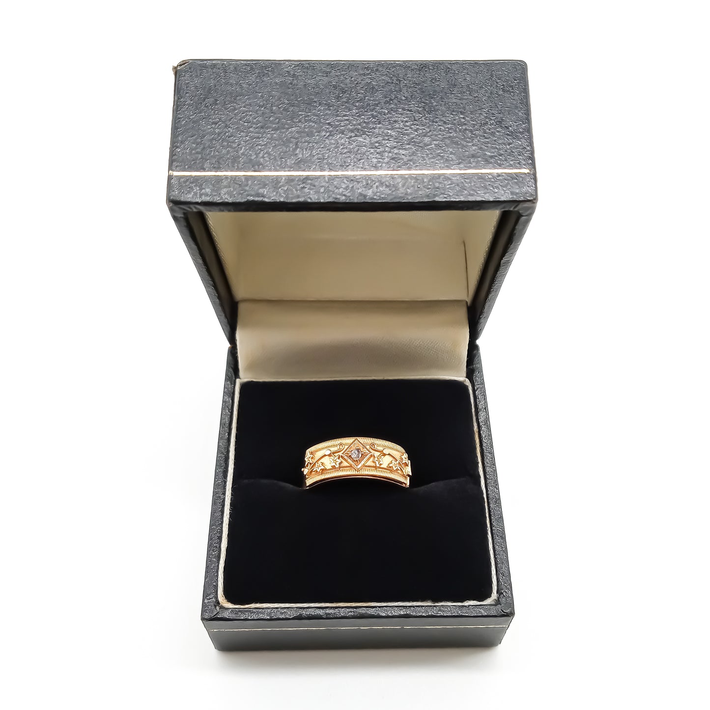 Rare 18ct gold Victorian REGARD ring set with a small mine-cut diamond and delicate leaf design in a black ring box.