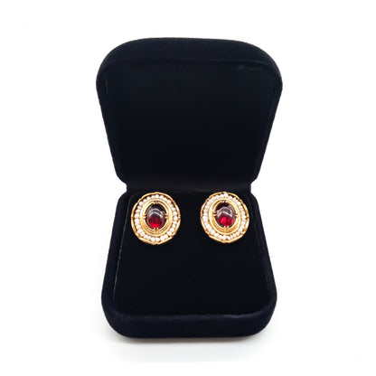 Gorgeous vintage silver gilt, cabochon garnet and seed pearl stud earrings in a black velvet box.