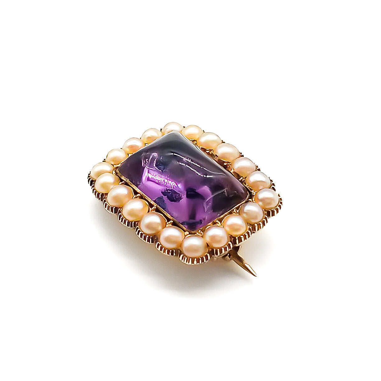 Lovely Georgian 15ct gold brooch set with a cabochon amethyst, surrounded by twenty lustrous seed pearls.