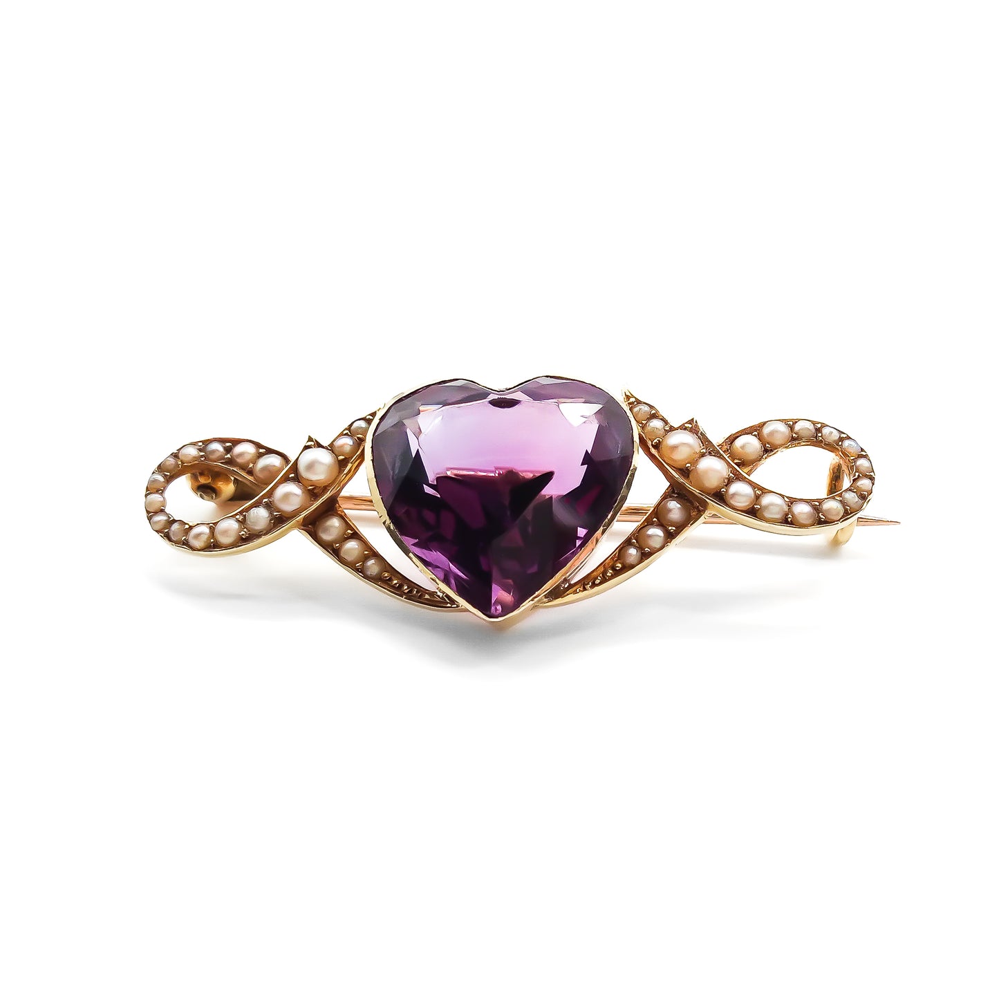 Stunning Victorian 15ct gold brooch set with a deep purple, heart-shaped amethyst and forty tiny seed pearls.