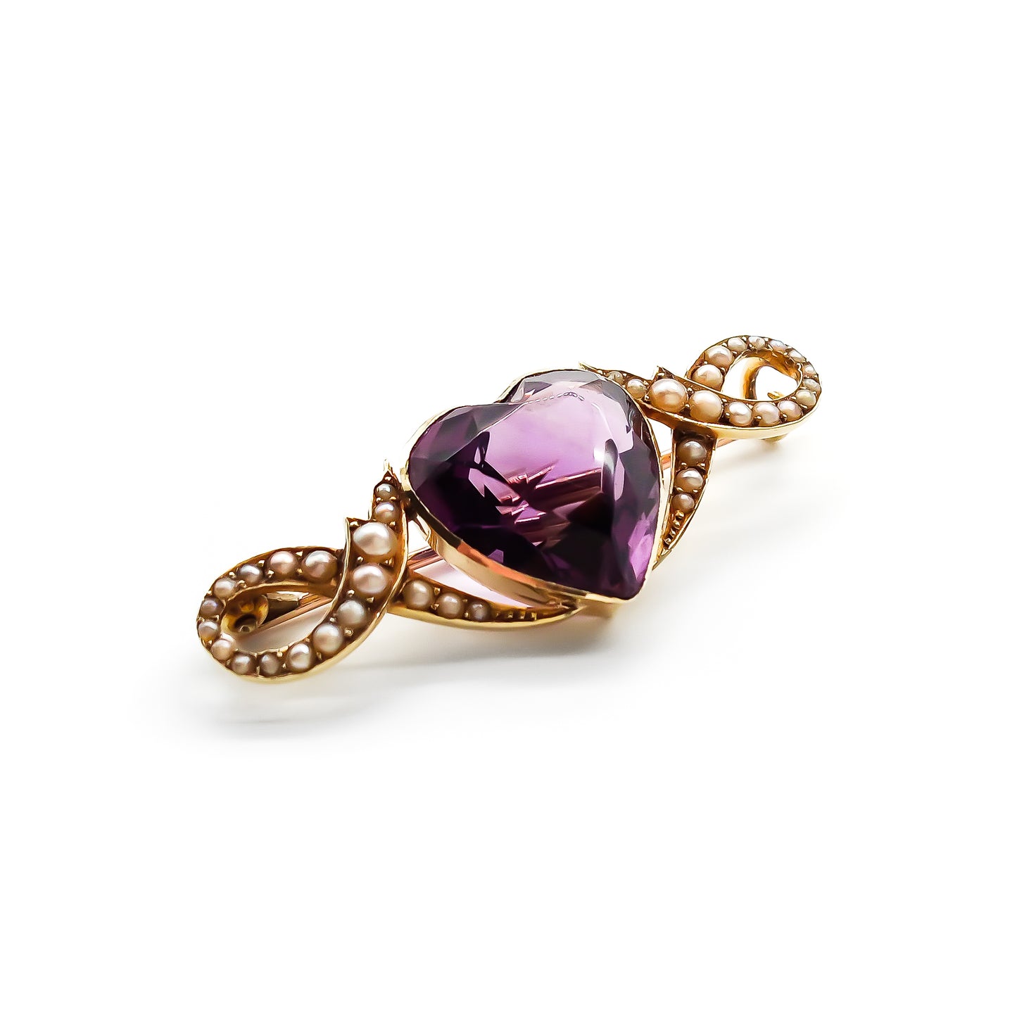 Stunning Victorian 15ct gold brooch set with a deep purple, heart-shaped amethyst and forty tiny seed pearls.