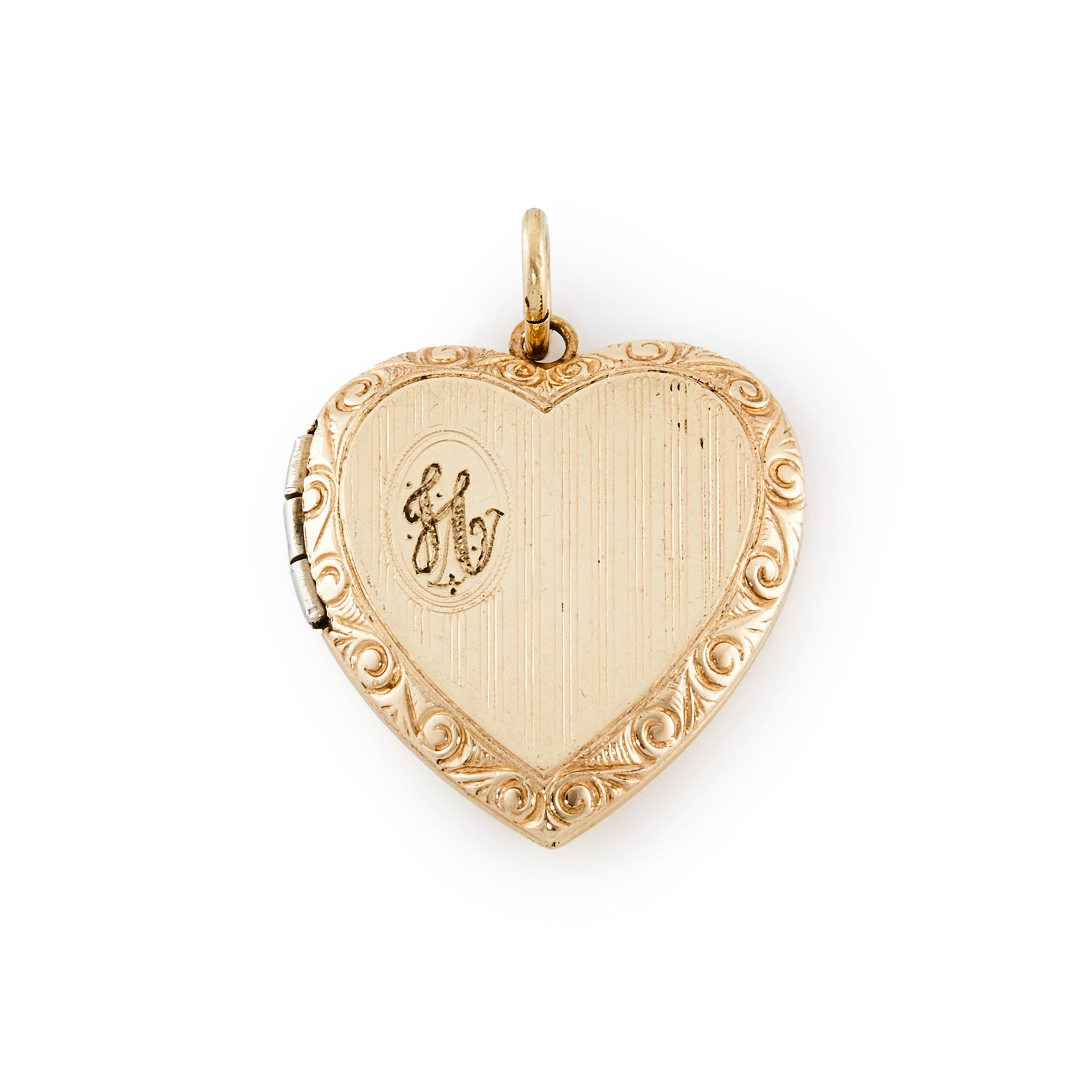 Lovely vintage 12ct rose gold filled heart locket, inscribed with the initial H. Locket takes two photographs.