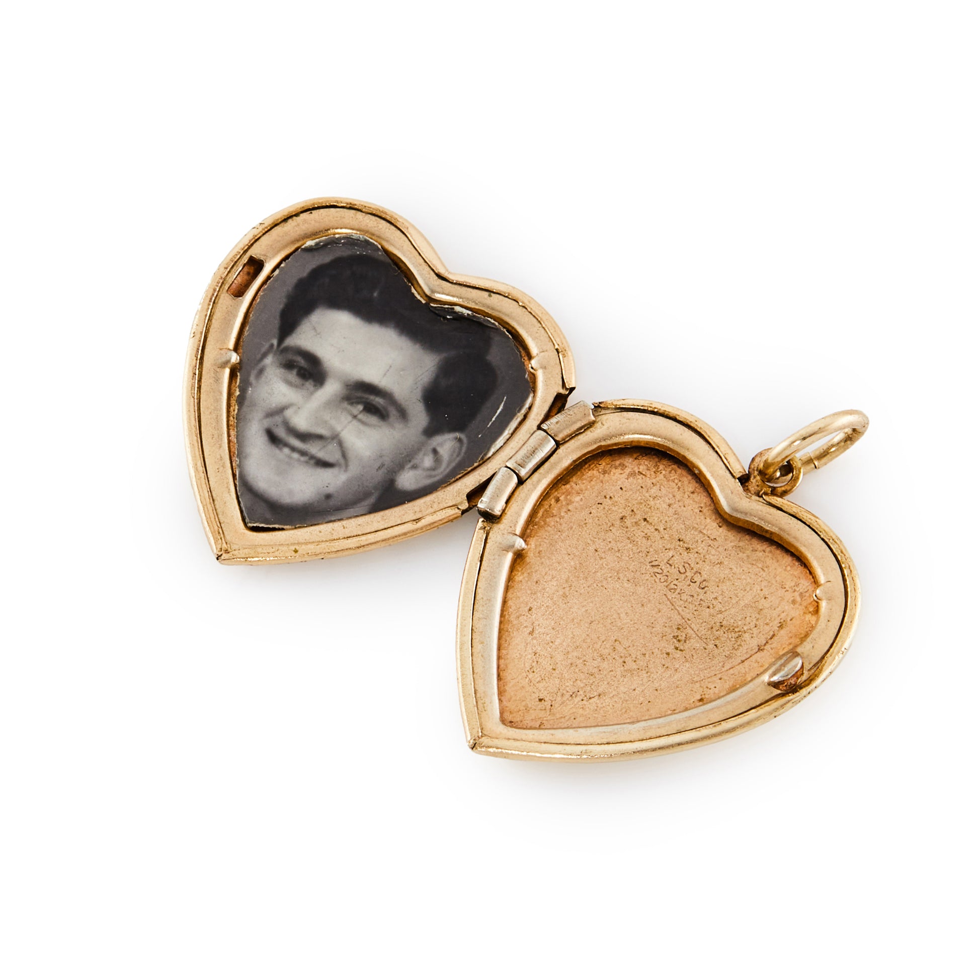 Lovely vintage 12ct rose gold filled heart locket, inscribed with the initial H. Locket takes two photographs.