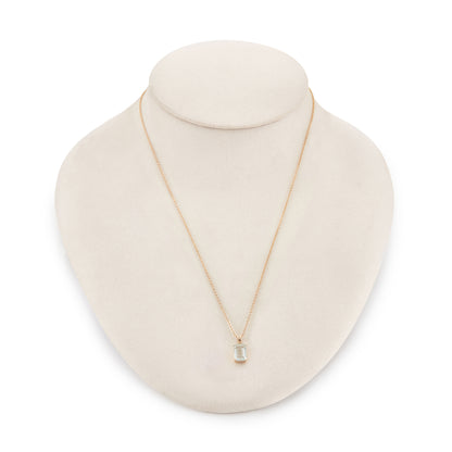 Lovely emerald-cut aquamarine in a 14ct gold pendant setting, on a 9ct gold chain.