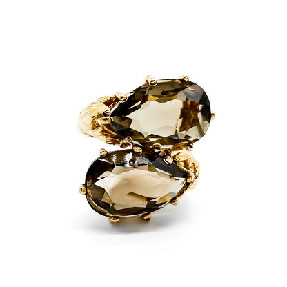 Stunning 14ct gold ring set with two beautifully faceted pear-shaped smoky quartz gemstones.