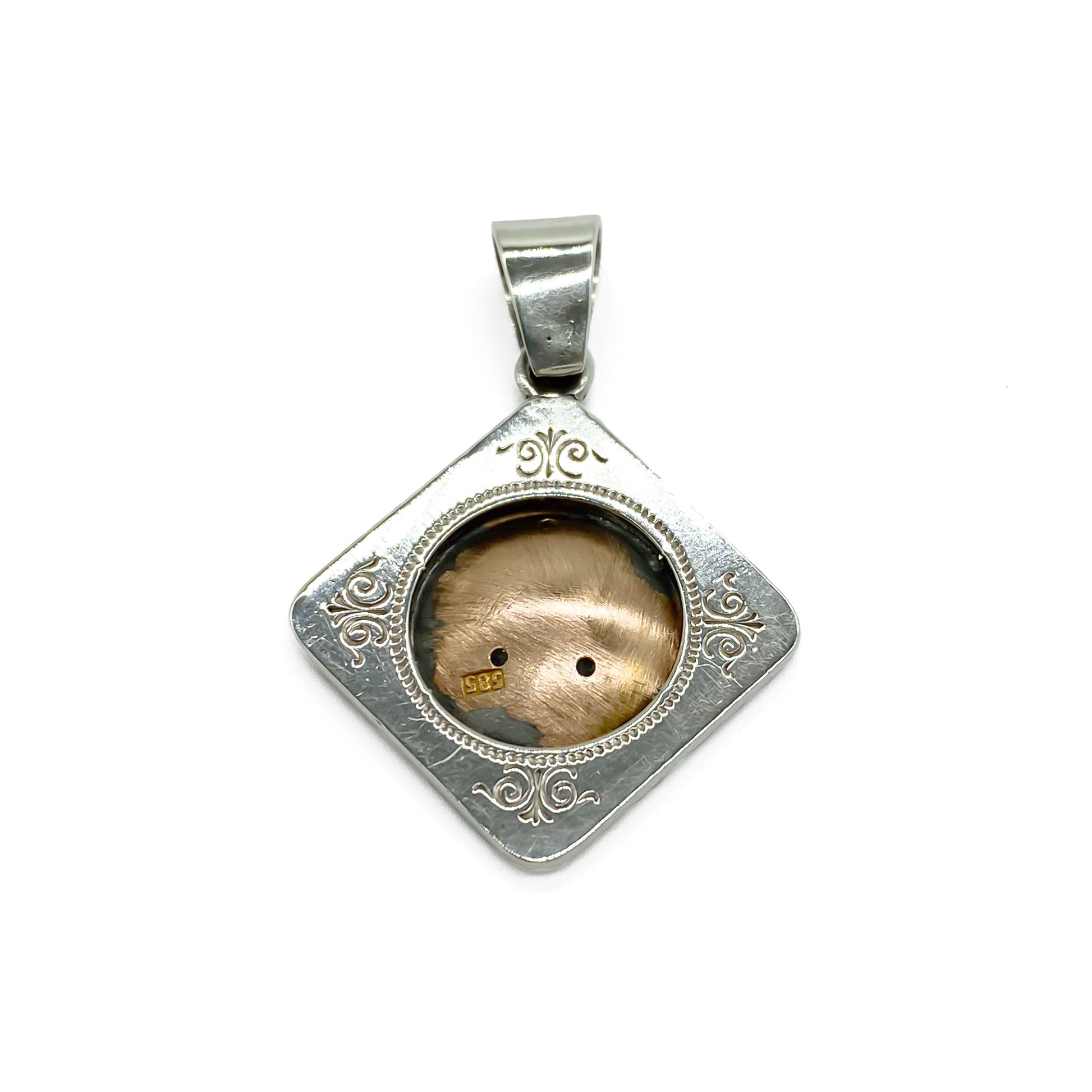 Pretty 14ct gold and silver antique enamelled flower pendant set with three tiny mine cut diamonds.