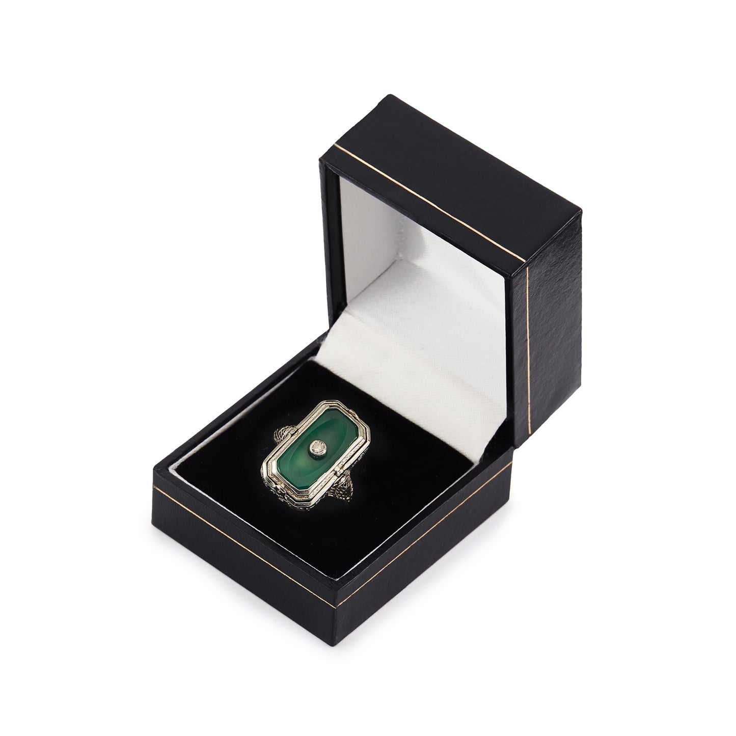 A very unusual 14ct white gold swivel ring set with a cameo of a woman wearing a diamond necklace on one side, and a green chrysoprase disc centred by a diamond on the other side. The versatile centre piece is surrounded by intricate filigree detail.