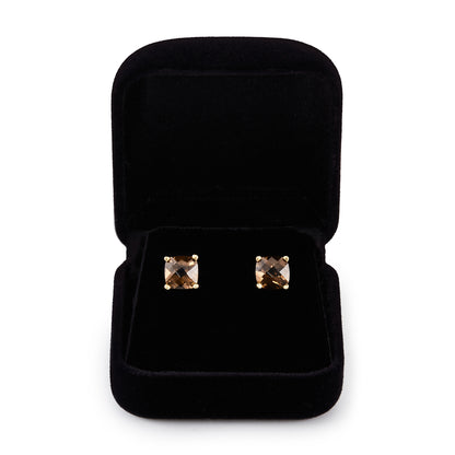 Beautifully faceted square smokey quartz stones, each set in a 14ct yellow gold setting.