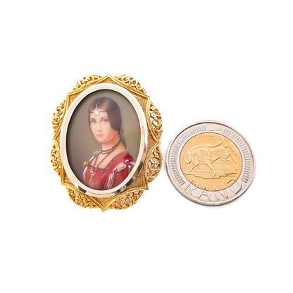 Gorgeous 18ct gold hand-painted miniature portrait pendant set with a tiny diamond and three rubies. Circa 1930’s