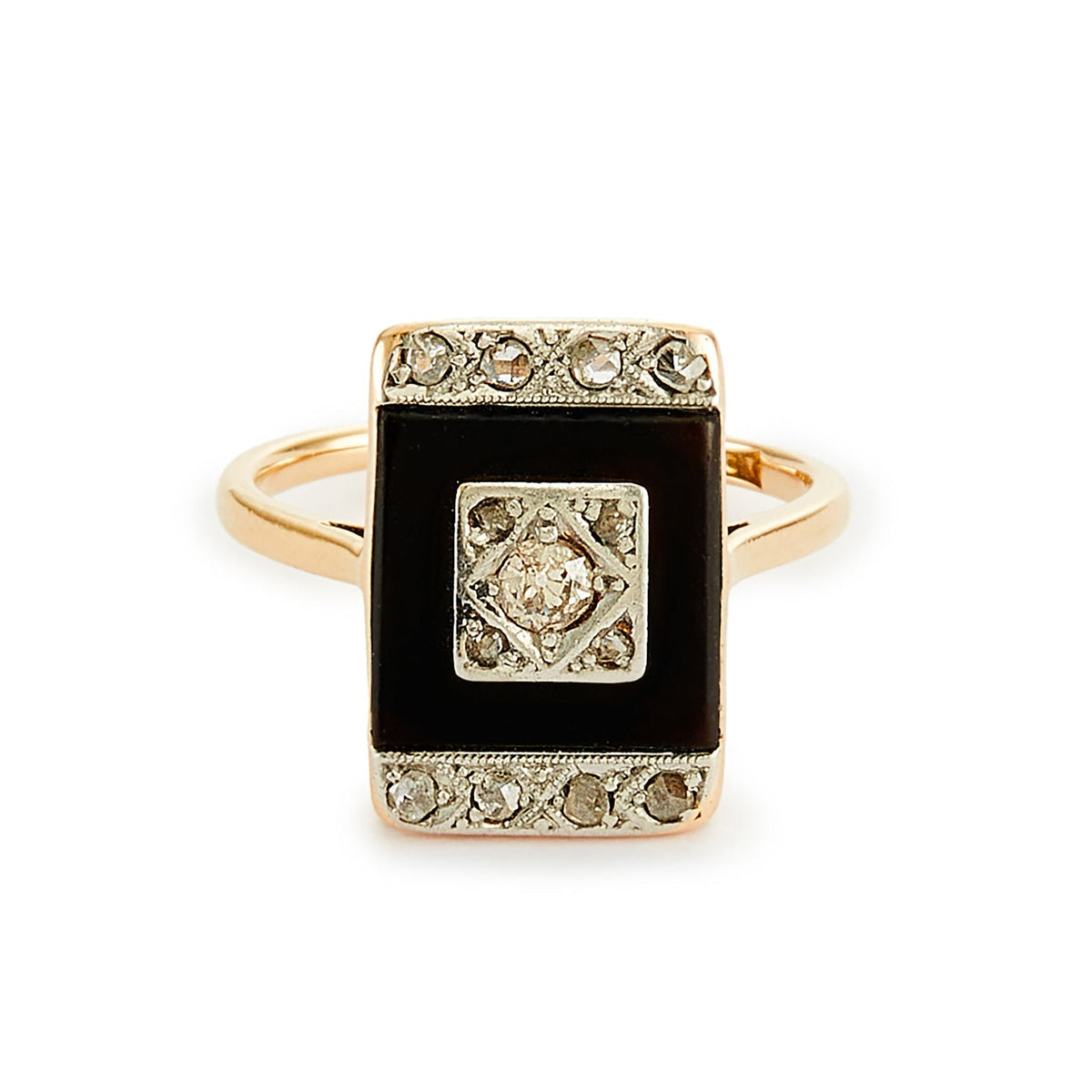 Stylish Art Deco 18ct gold ring set with an onyx disc, embellished with a centre old cut diamond, and four mine cut diamonds in a platinum setting, surrounded with smaller mine cut diamonds in a platinum setting on the edges. 
