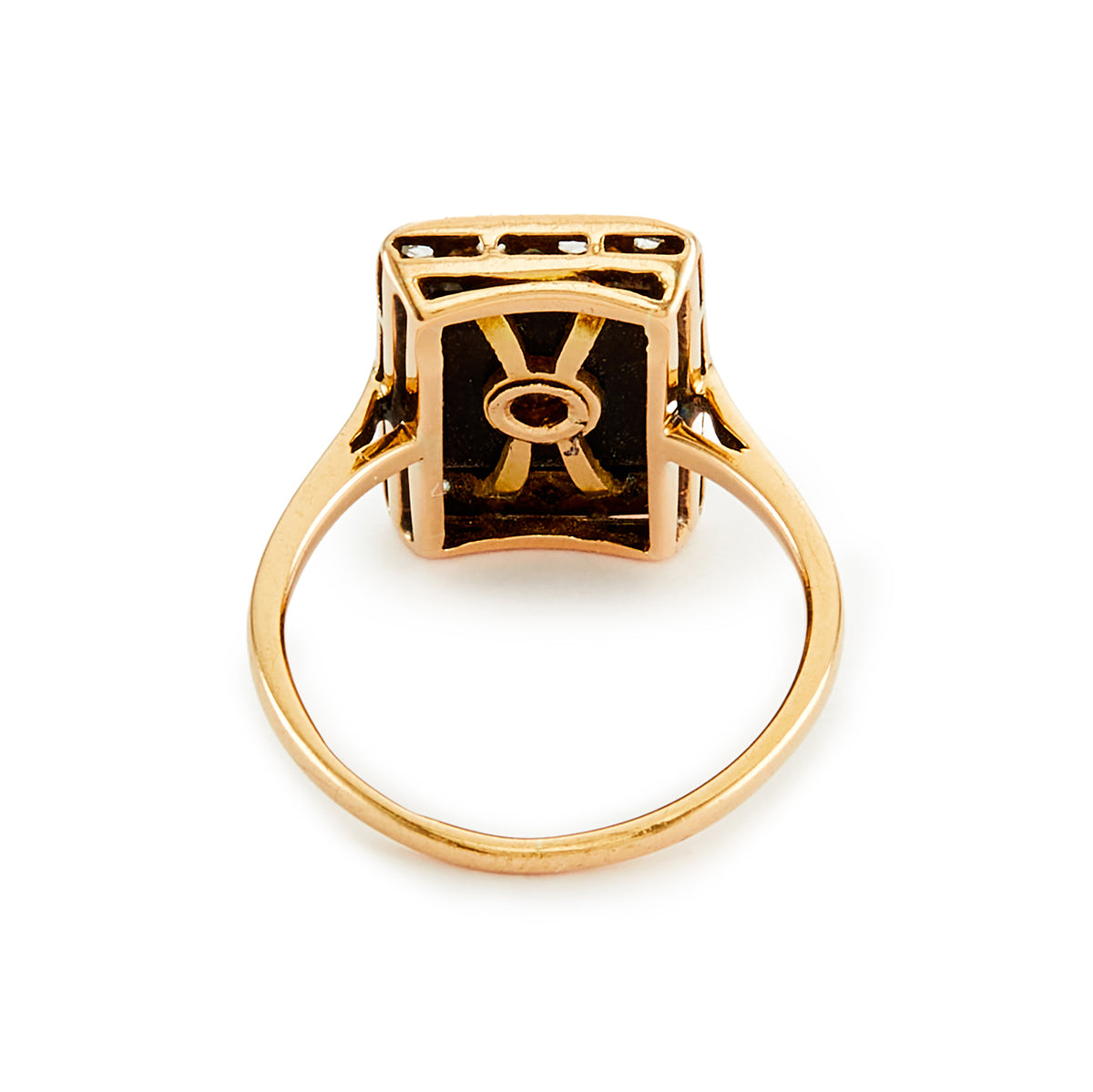 Stylish Art Deco 18ct gold ring set with an onyx disc, embellished with a centre old cut diamond, and four mine cut diamonds in a platinum setting, surrounded with smaller mine cut diamonds in a platinum setting on the edges. 