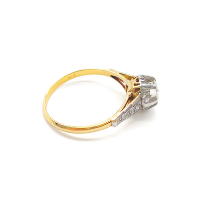 Classic 18ct yellow and white gold ring set with a 0.40ct old-European cut centre diamond and a tiny old-cut diamond on each shoulder.