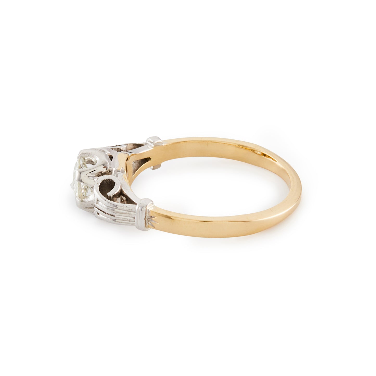 Classic 18ct gold ring, set with an old cut 0.40ct diamond in an ornate white gold setting.