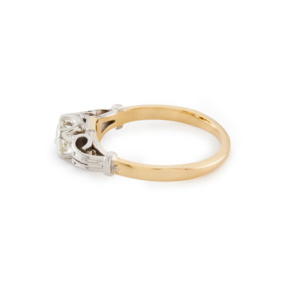 Classic 18ct gold ring, set with an old cut 0.40ct diamond in an ornate white gold setting.