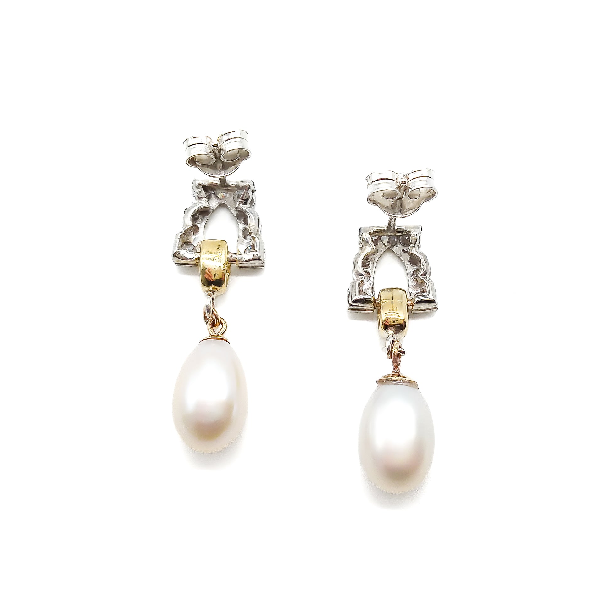 Stunning pair of 18ct white and yellow gold dangling earrings, each set with six small diamonds and a pearl drop.