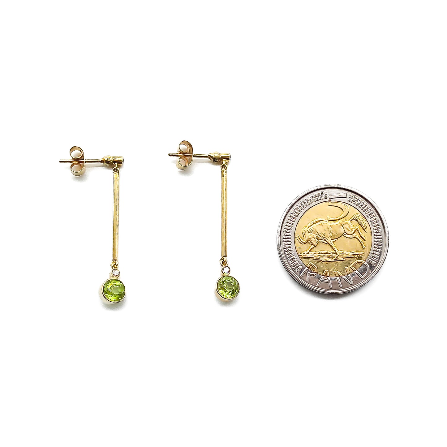 Classic 18ct gold drop earrings, each set with two small diamonds and a beautifully faceted peridot.