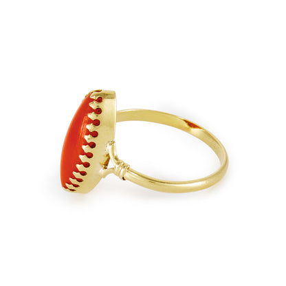 Elegant 18ct gold ring, set with a deep red marquise shaped natural piece of Mediterranean coral.