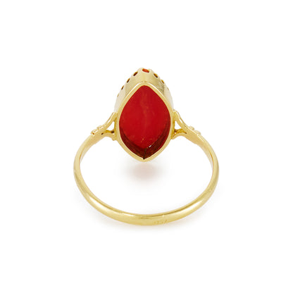 Elegant 18ct gold ring, set with a deep red marquise shaped natural piece of Mediterranean coral.