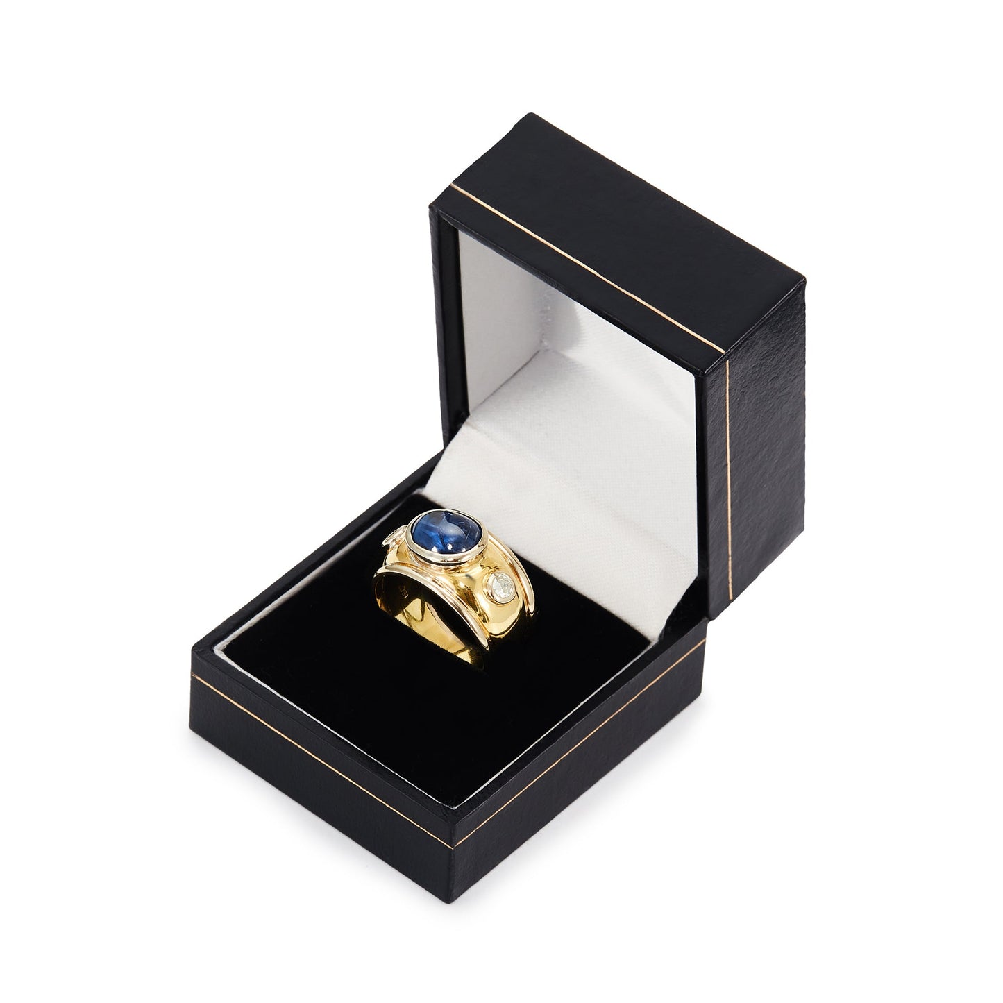Glamorous 18ct yellow and white gold ring tube-set with a centre cabochon sapphire and a diamond on each side.