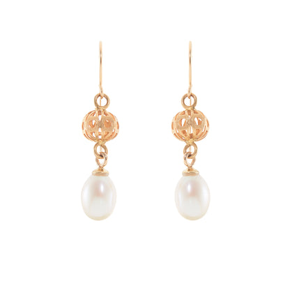 Vintage 18ct yellow gold dangling earrings, each set with a lustrous pearl drop.