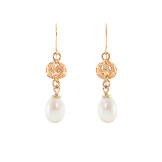 Vintage 18ct yellow gold dangling earrings, each set with a lustrous pearl drop.