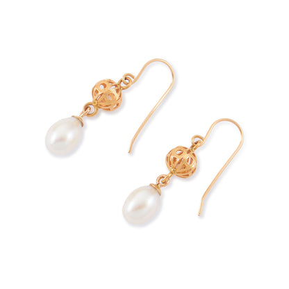 Vintage 18ct yellow gold dangling earrings, each set with a lustrous pearl drop.