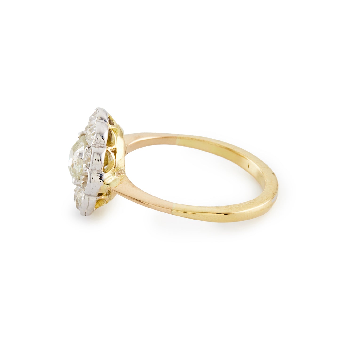 Stylish 18ct gold ring with a 0.60ct old cut diamond in a platinum halo setting, consisting of eleven 0.10ct old cut diamonds. Circa 1920’s