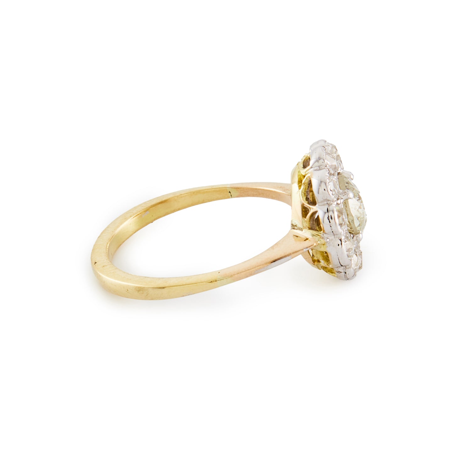 Stylish 18ct gold ring with a 0.60ct old cut diamond in a platinum halo setting, consisting of eleven 0.10ct old cut diamonds. Circa 1920’s