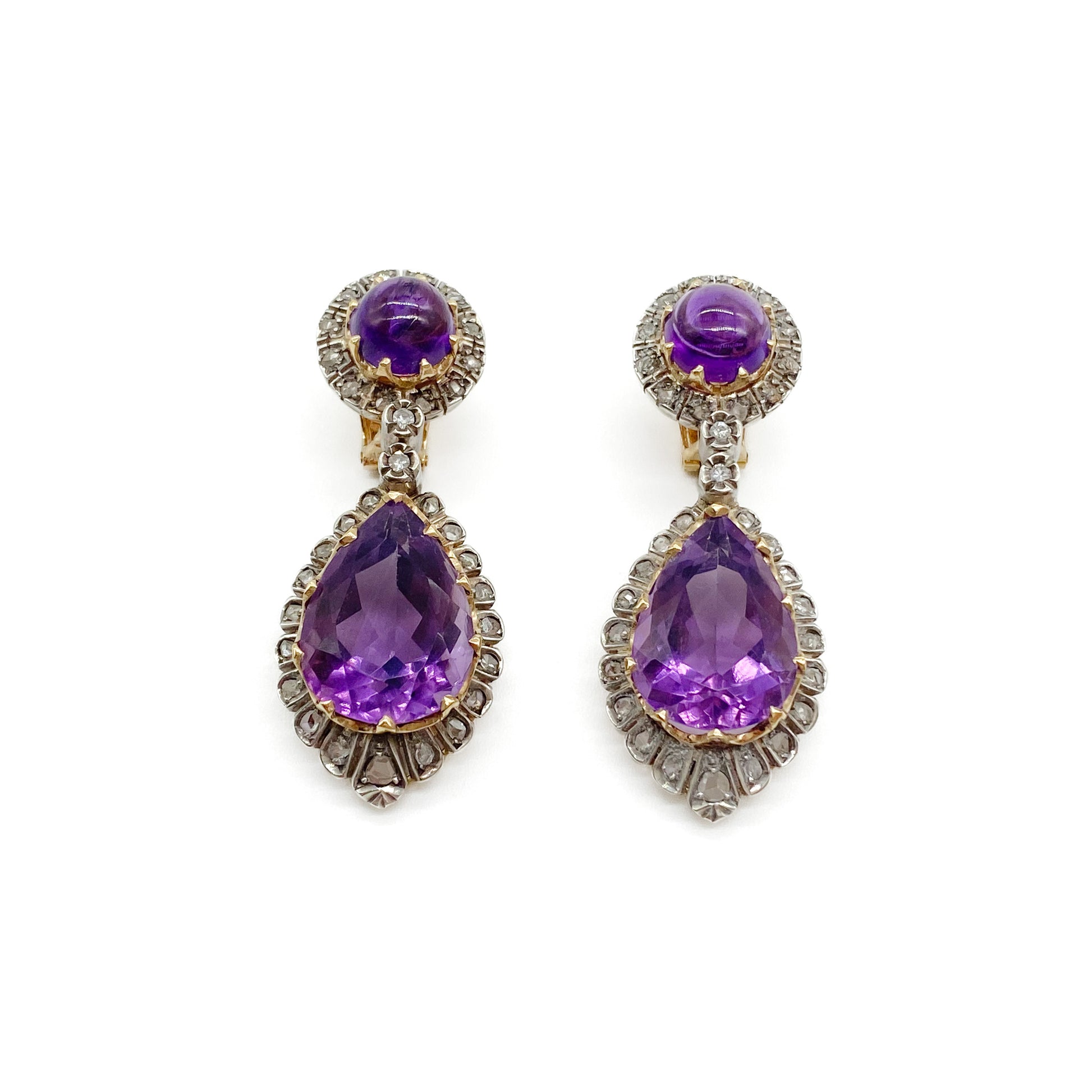 Magnificent antique 18ct yellow gold and silver articulated drop earrings, each set with a teardrop shaped faceted amethyst and a round cabochon amethyst, surrounded by thirty-one mine-cut diamonds and two old-cut diamonds.