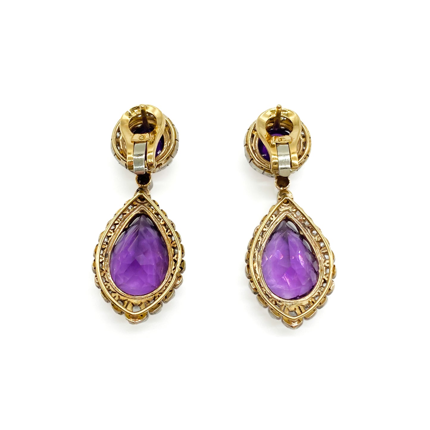 Magnificent antique 18ct yellow gold and silver articulated drop earrings, each set with a teardrop shaped faceted amethyst and a round cabochon amethyst, surrounded by thirty-one mine-cut diamonds and two old-cut diamonds.