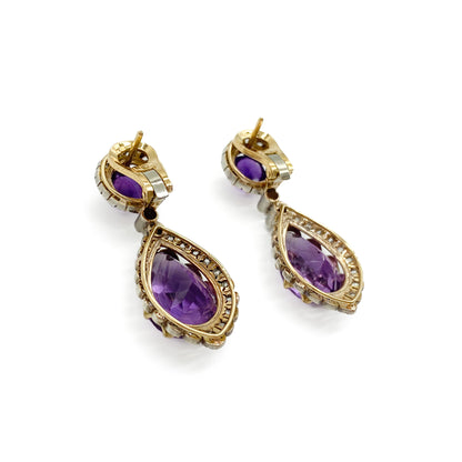 Magnificent antique 18ct yellow gold and silver articulated drop earrings, each set with a teardrop shaped faceted amethyst and a round cabochon amethyst, surrounded by thirty-one mine-cut diamonds and two old-cut diamonds.