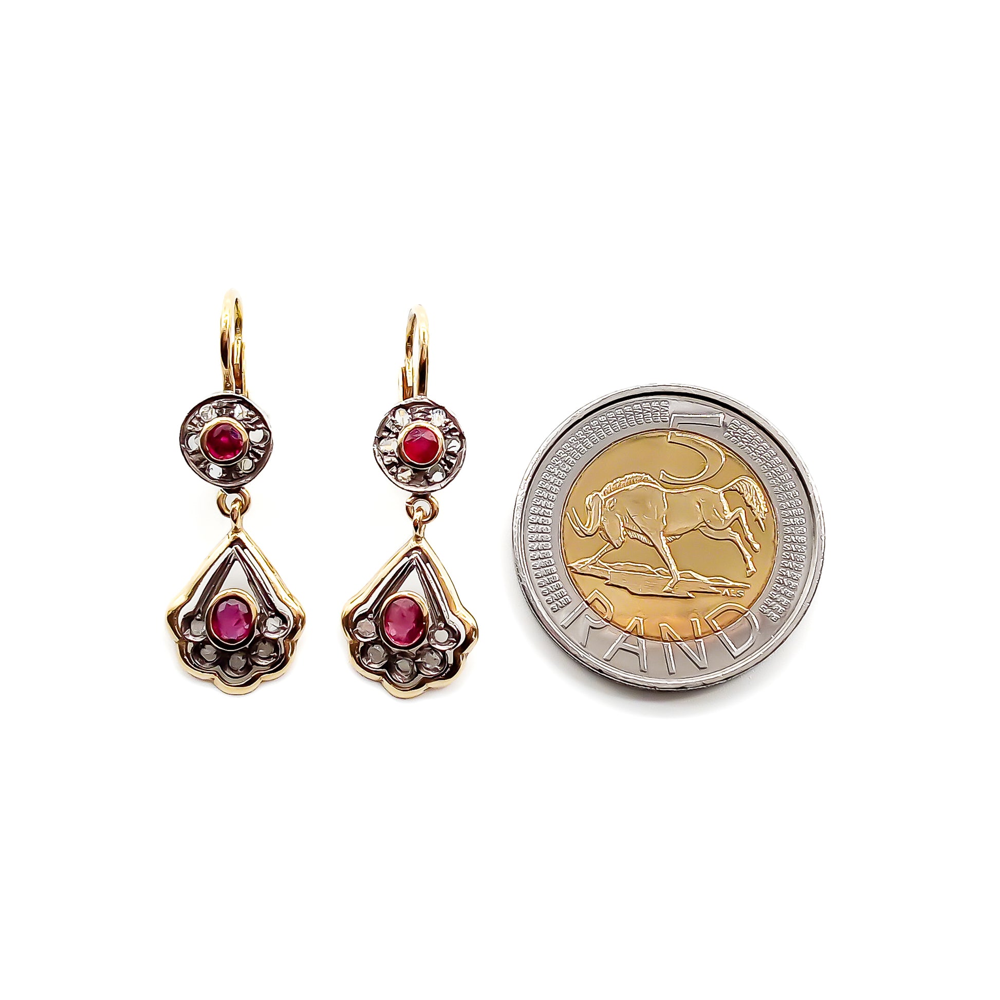 Dainty 18ct yellow gold and silver earrings, each set with two faceted rubies and eleven mine-cut diamond chips. Italy