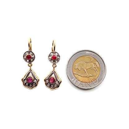 Dainty 18ct yellow gold and silver earrings, each set with two faceted rubies and eleven mine-cut diamond chips. Italy