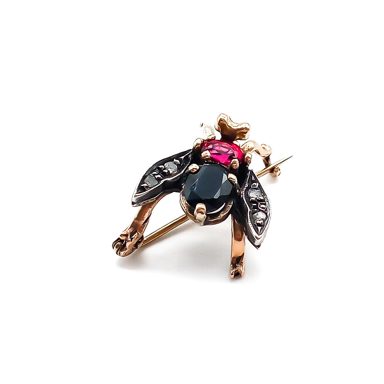 Charming 18ct rose gold and silver insect brooch set with a faceted onyx, garnet and four flat-cut diamonds. Italy