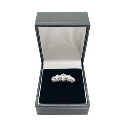 Stunning 18ct white gold vintage ring set with five near colourless, round brilliant cut diamonds. Comes with a Gem Lab valuation certificate.