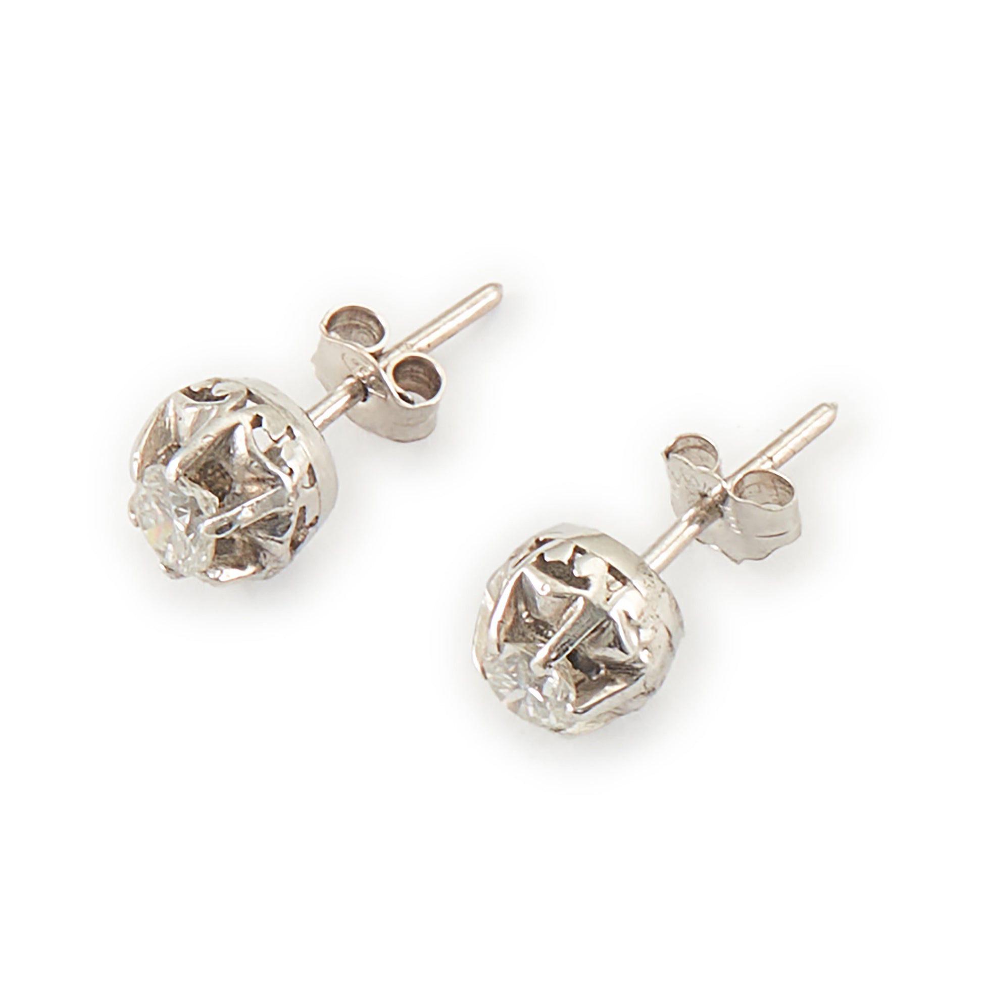 Classic 18ct white gold stud earrings, each with a 0.20ct diamond in a six claw setting. Argentina.
